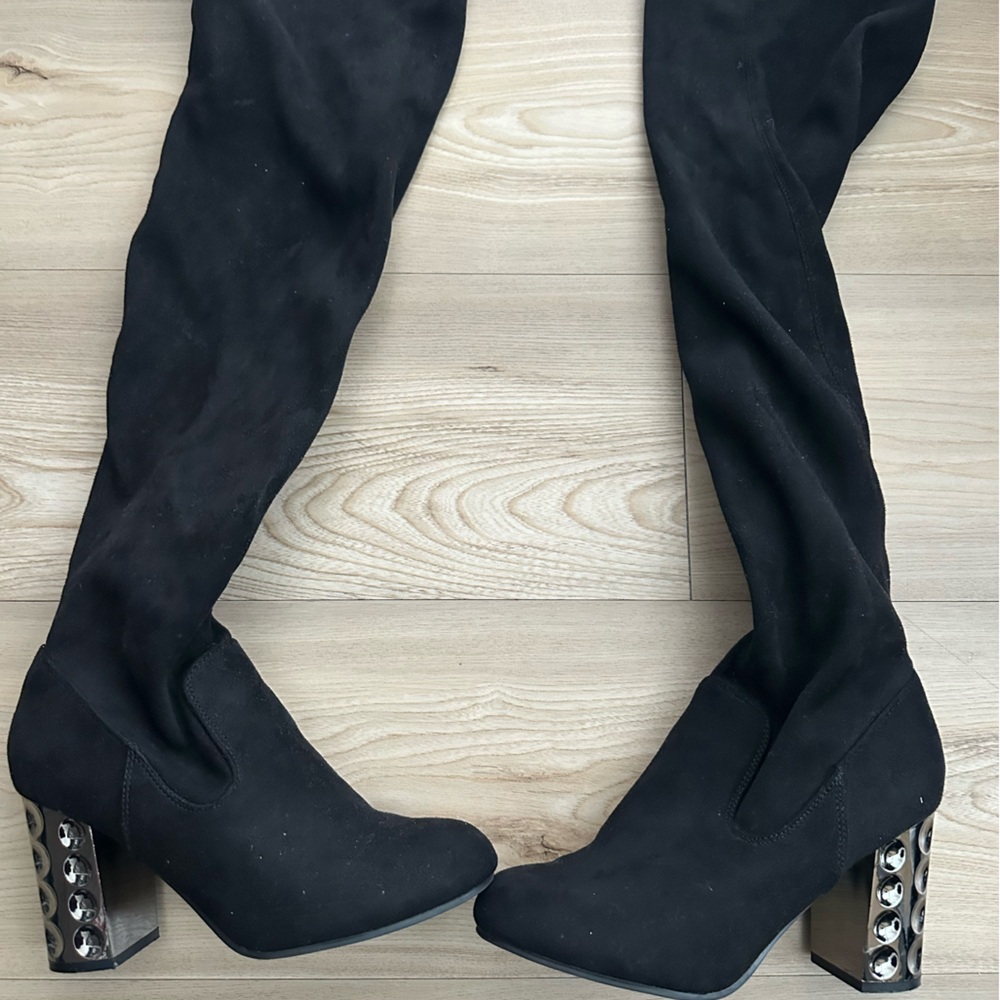 Black suede over the knee boots with chrome heel.